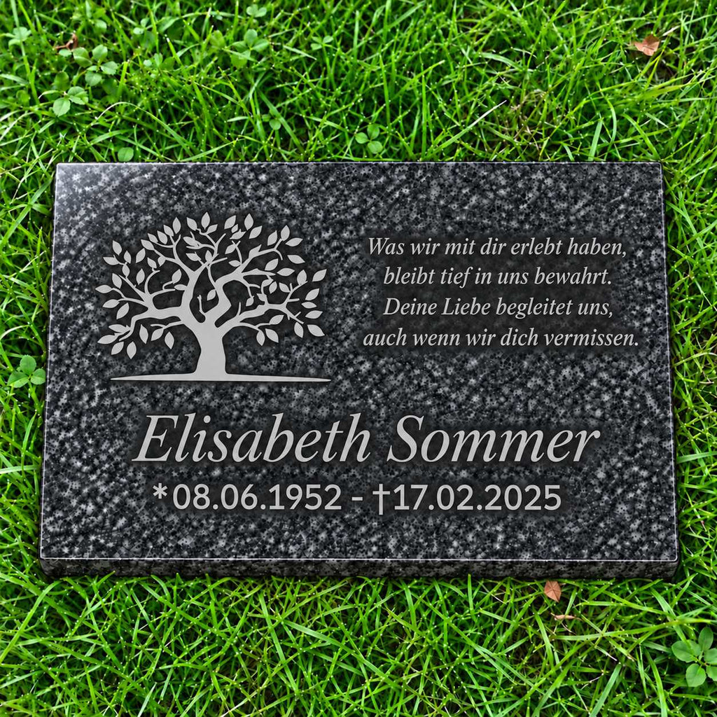 Graue Granit-Gedenktafel Impala mit hellgrauem Lebensbaum sowie Name, Datum und Gedicht in Hellgrau auf grünem Rasen.