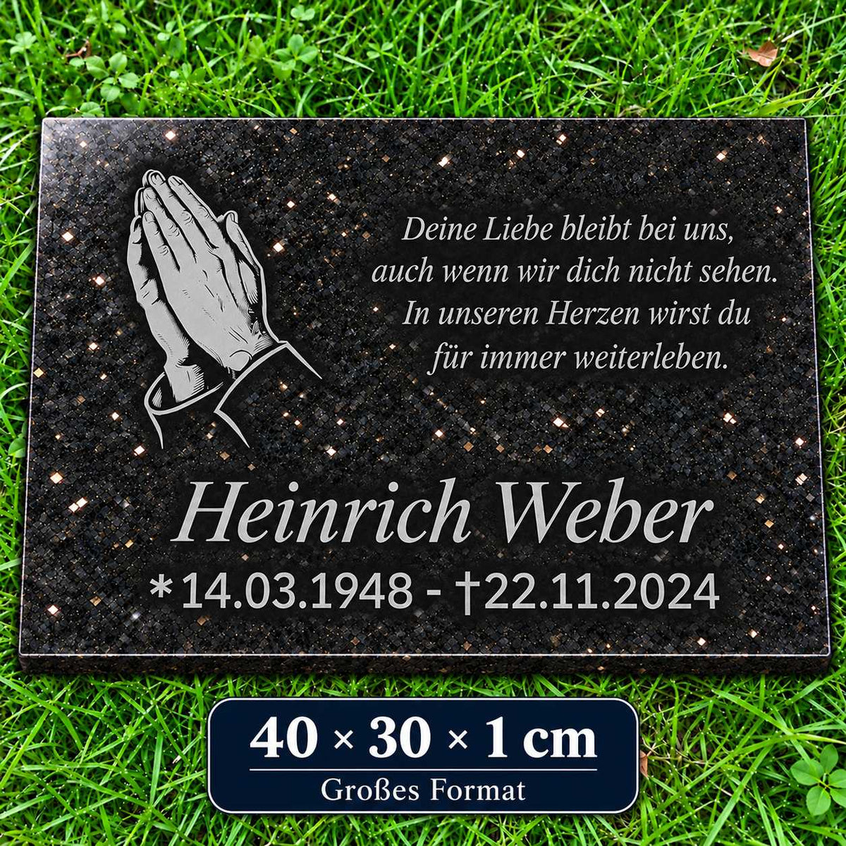 Grabstein Granit Star Galaxy, 40 × 30 × 1 cm, mit silbergrauen betenden Händen, Name, Lebensdaten und Gedicht auf grünem Rasen.