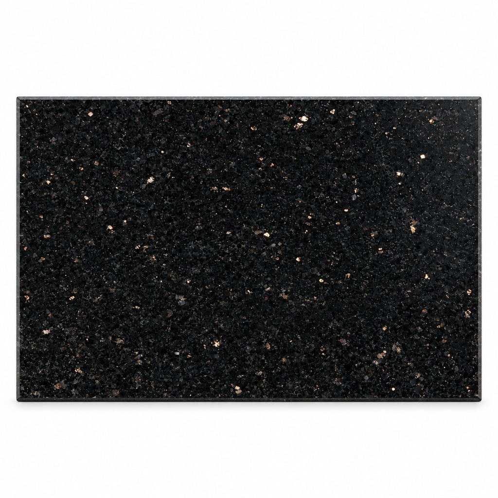 Unbeschriftete Granit-Gedenktafel Star Galaxy mit schwarzer Oberfläche und goldfarbenen Mineralflecken im Querformat vor weißem Hintergrund.